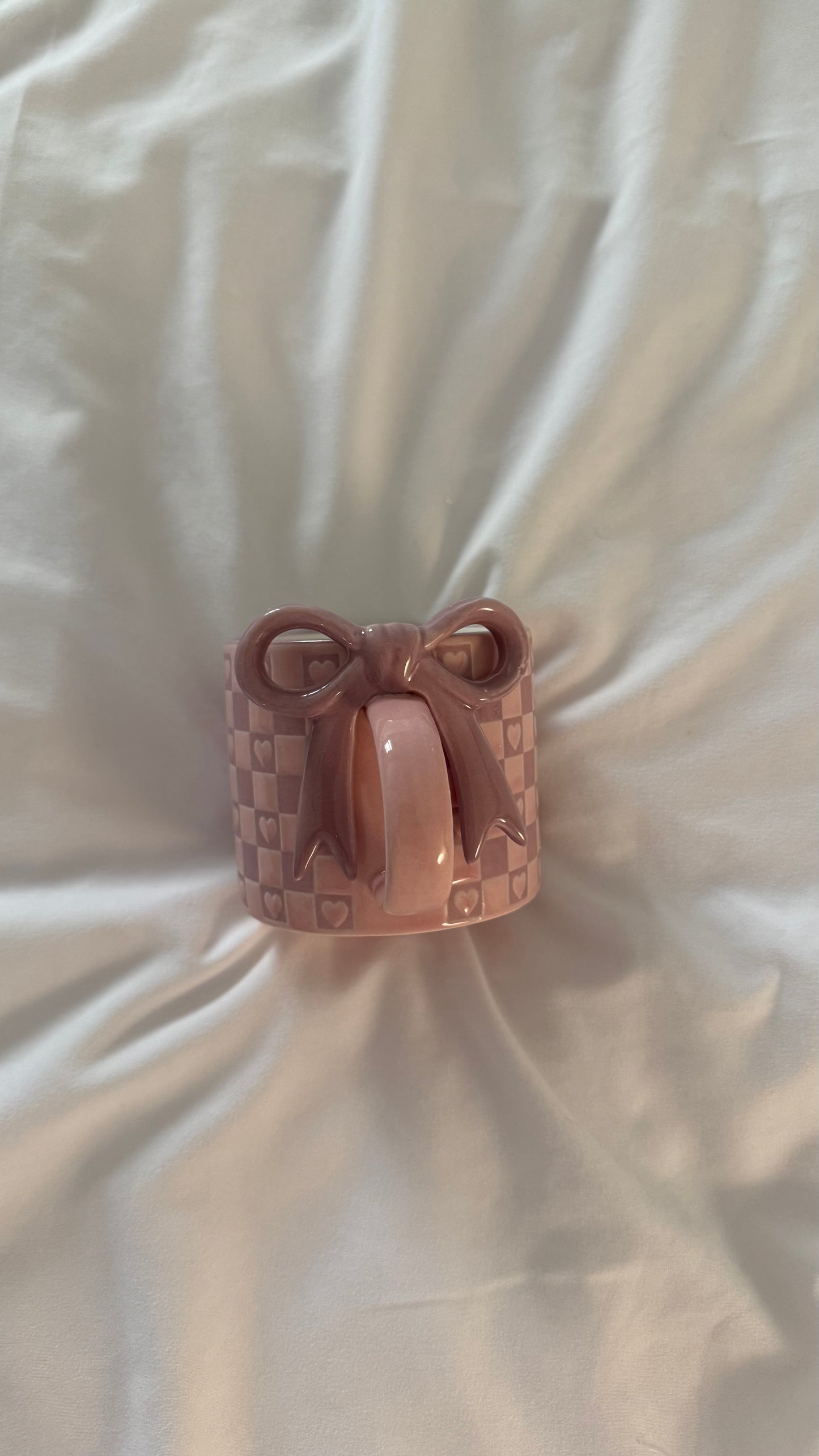 Pink checkered bow mug